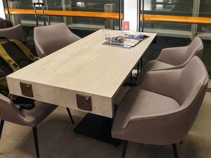 Dining table with power outlets, Marhaba Lounge Singapore T3.